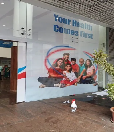 Hospital lobby wall with a large printed graphic